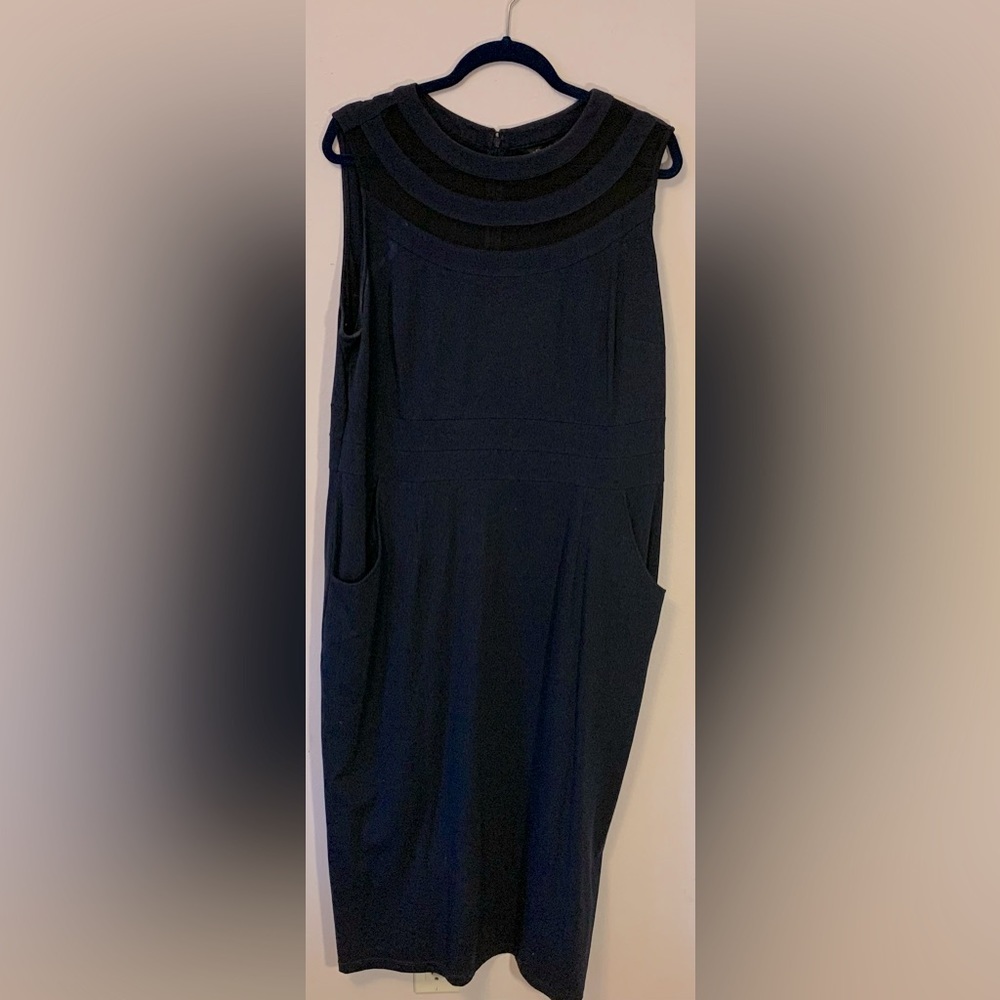 Navy column dress, sheer neckline panels, pockets, dress has nice stretch